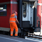transportation working near train tracks